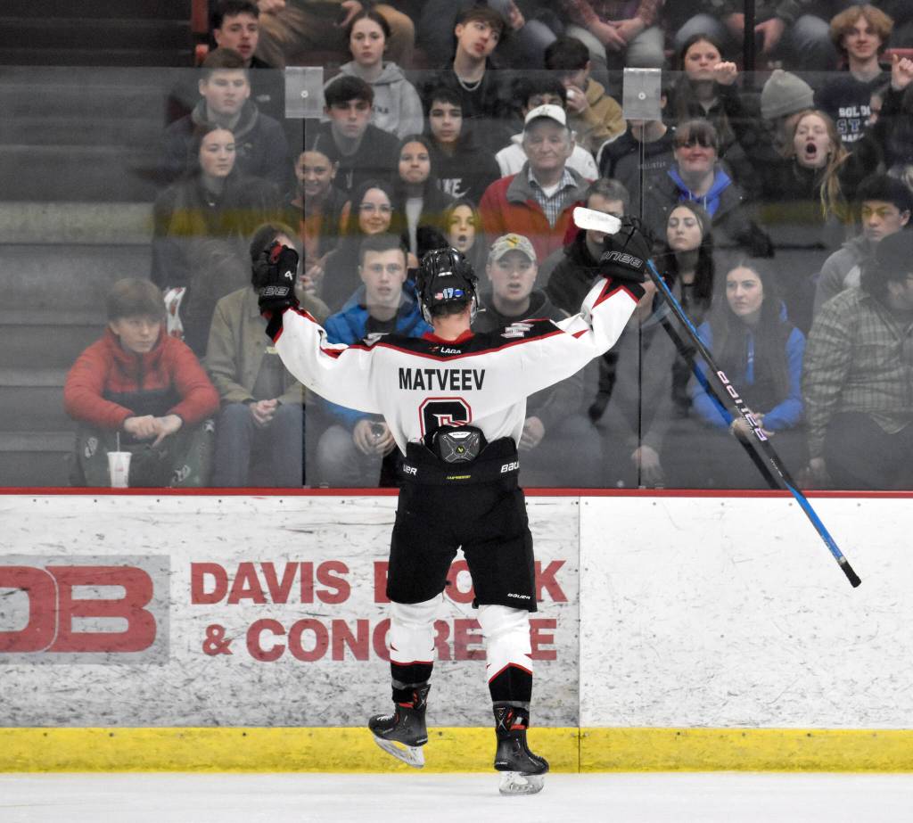 Houstons Daniel Matveev celebrates a goal in front of an unimpressed Soldotna student section at the Division II state hockey tournament Saturday, Feb. 3, 2024, at the Soldotna Regional Sports Complex in Soldotna, Alaska. (Photo by Jeff Helminiak/Peninsula Clarion)