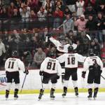 Photo by Jeff Helminiak/Peninsula Clarion
Daniel Matveev celebrates his goal at the Division II state hockey tournament Saturday at the Soldotna Regional Sports Complex.