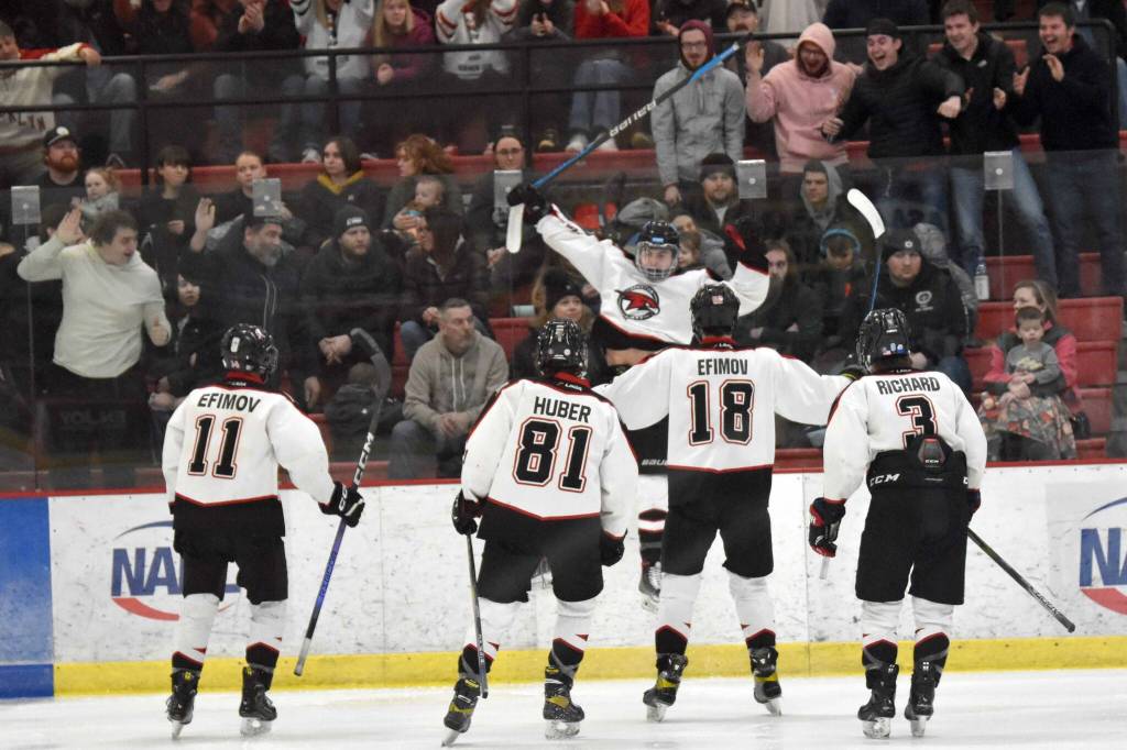 Daniel Matveev celebrates his goal at the Division II state hockey tournament Saturday, Feb. 3, 2024, at the Soldotna Regional Sports Complex in Soldotna, Alaska. (Photo by Jeff Helminiak/Peninsula Clarion)