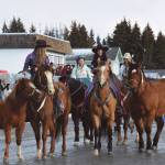 The Alaska Stars Drill Team rides down Pioneer Avenue at the 70th annual Homer Winter Carnival Parade on Saturday, Feb. 10, 2024 in Homer, Alaska. (Delcenia Cosman/Homer News)