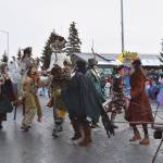 Costumed community members walking with Homer Drawdown outlandishly enliven the 70th annual Homer Winter Carnival Parade on Pioneer Avenue on Saturday, Feb. 10, 2024 in Homer, Alaska with walkable, wearable sculptures created during Bunnell Street Arts Centers January Makers Space sessions. (Delcenia Cosman/Homer News)