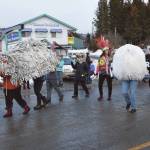Photos by Delcenia Cosman/Homer News
Costumed community members walking with Homer Drawdown puppet a Grubby the Possum marionette, created during Bunnell Street Arts Centers January Makers Space sessions, at the 70th annual Homer Winter Carnival Parade on Pioneer Avenue on Saturday.
