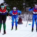 Colony's Elliot Sensabaugh leads Soldotna's Ariana Cannava and Tania Boonstra early during the Region III Girls 7.5K Classic Race at Tsalteshi Trails near Soldotna, Alaska, on Saturday, Feb. 10, 2024. (Jake Dye/Peninsula Clarion)