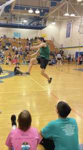 Photo by Emilie Springer/Homer News
Homer freshman Tristyn Larrick competes in the one foot high kick on Saturday, Feb. 17 during the Kachemak Bay Winter Games at Homer High School.