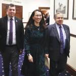 U.S. Rep. Mary Peltola, center, walks with Alaska Rep. Will Stapp, R-Fairbanks, and Alaska Sen. Lyman Hoffman, D-Bethel, into the Alaska House of Representatives chambers ahead of her annual address to the Alaska Legislature on Monday in Juneau. (Mark Sabbatini/Juneau Empire)