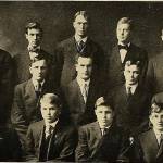 William Raymond W.R. Benson (front row, far right) poses along with the rest of the Sigma Nu fraternity at Albion College in Michigan in about 1908. Despite a lifetime spent in the public eye, Benson was apparently seldom captured on film. This image is one of the few photos of him known to exist. (photo from the 1908 Albion College yearbook via ancestry.com)