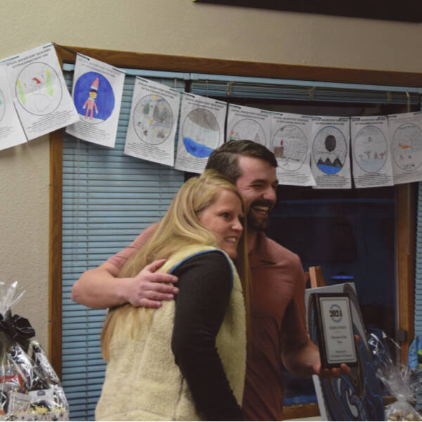 Anchor Point Chamber of Commerce board of directors president Dawson Slaughter (right) presents Chapman School principal Heidi Stokes with the Educator/Faculty of the Year Award during the Community Awards ceremony on Saturday<ins>, March 2, 2024 at the VFW in Anchor Point, Alaska</ins>. (Delcenia Cosman/Homer News)