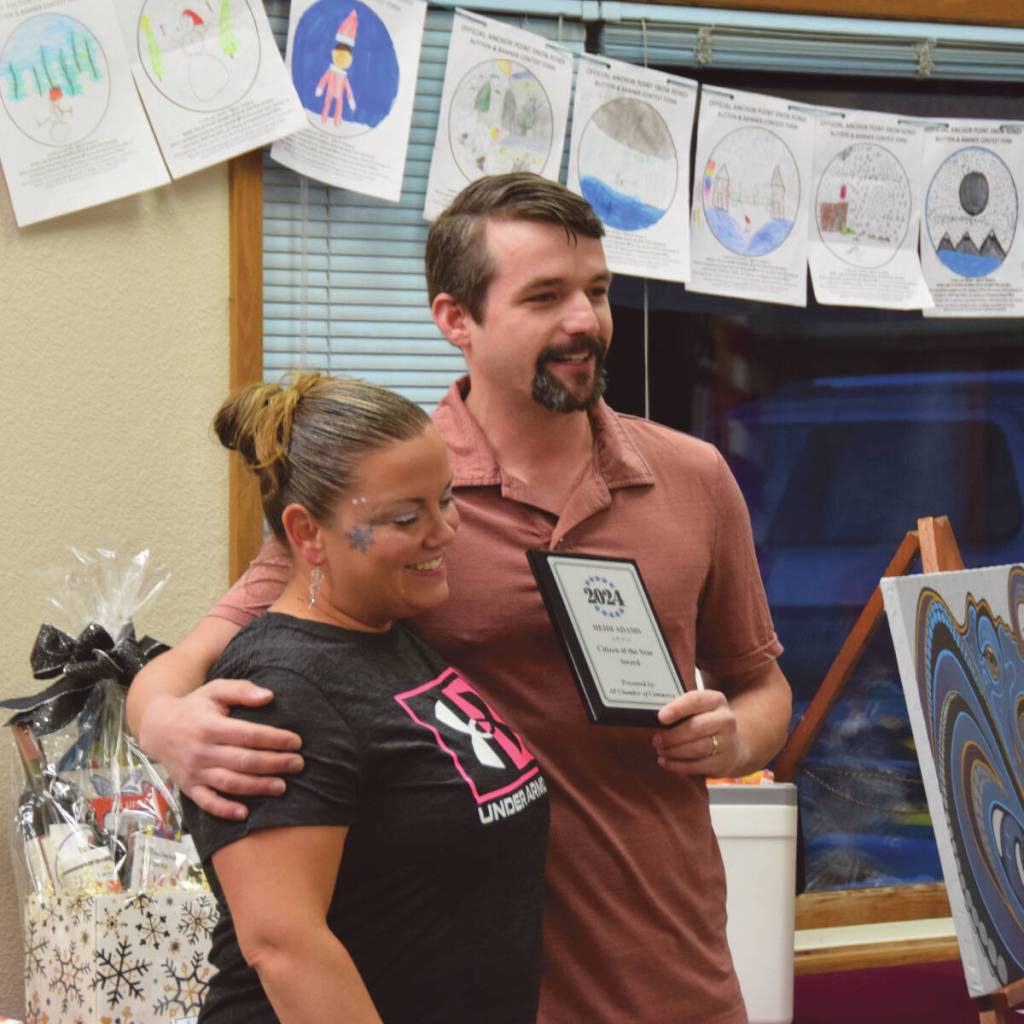 Anchor Point Chamber of Commerce board of directors president Dawson Slaughter (right) presents Heidi Adams (left), canteen manager at VFW Post 10221, with the Citizen of the Year Award during the Community Awards ceremony on Saturday<ins>, March 2, 2024 at the VFW in Anchor Point, Alaska</ins>. (Delcenia Cosman/Homer News)