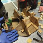 Photo provided by Karyn Murphy
Patty Lekanoff-Gregory demonstrates how to form a hat with a frame and clamps in the lab at Islands and Oceans.