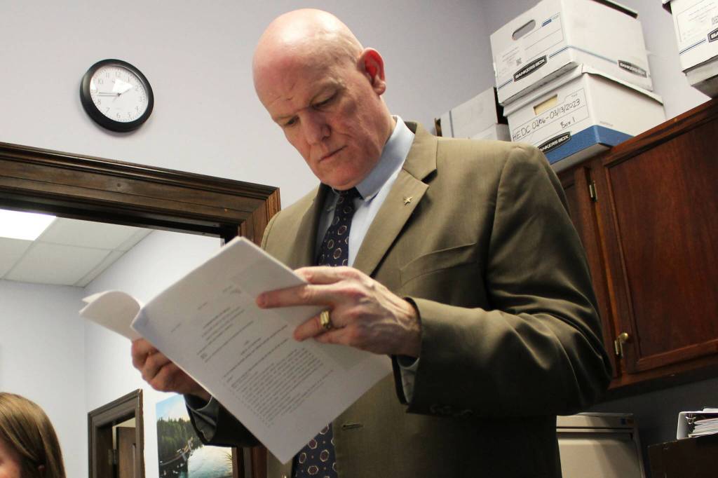 Bud Sexton, chief of staff for Alaska House Rep. Justin Ruffridge, reviews amendment language in their office at the Alaska State Capitol building on Wednesday, March 6, 2024, in Juneau, Alaska. (Ashlyn OHara/Peninsula Clarion)