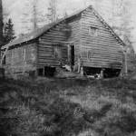 What are almost certainly members of the Grönroos family pose in front of their Anchor Point home in this undated photograph courtesy of William Wade Carroll. The cabin was built in about 1903-04 just north of the mouth of the Anchor River.