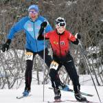 NIva Flagstad, 11, leads her father, Trond Flagstad, associate head coach for mens and womens Nordic skiing at the University of Alaska Anchorage, up a long climb in the Kachemak Ski Marathon just outside of Homer, Alaska, on Saturday, March 16, 2024. (Photo by Erin Thompson/Peninsula Clarion)