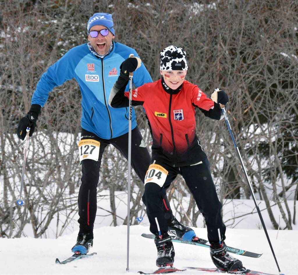 NIva Flagstad, 11, leads her father, Trond Flagstad, associate head coach for mens and womens Nordic skiing at the University of Alaska Anchorage, up a long climb in the Kachemak Ski Marathon just outside of Homer, Alaska, on Saturday, March 16, 2024. (Photo by Erin Thompson/Peninsula Clarion)