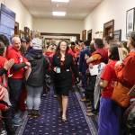 Rep. Sarah Vance, R-Homer, walks into the Alaska House of Representatives before consideration of a veto override regarding education funding on Monday, March 18, 2024 in Juneau, Alaska. (Mark Sabbatini/Juneau Empire)