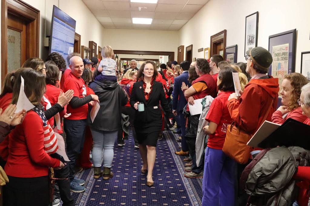 Rep. Sarah Vance, R-Homer, walks into the Alaska House of Representatives before consideration of a veto override regarding education funding on Monday, March 18, 2024 in Juneau, Alaska. (Mark Sabbatini/Juneau Empire)