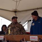 Mike Maxon (center) accepts the sixth place trophy with his son, who was also his fishing partner, at the 30th annual Homer Winter King Salmon Tournament on Saturday, March 23, 2024 at the Deep Water Dock on the Spit in Homer, Alaska. (Delcenia Cosman/Homer News)