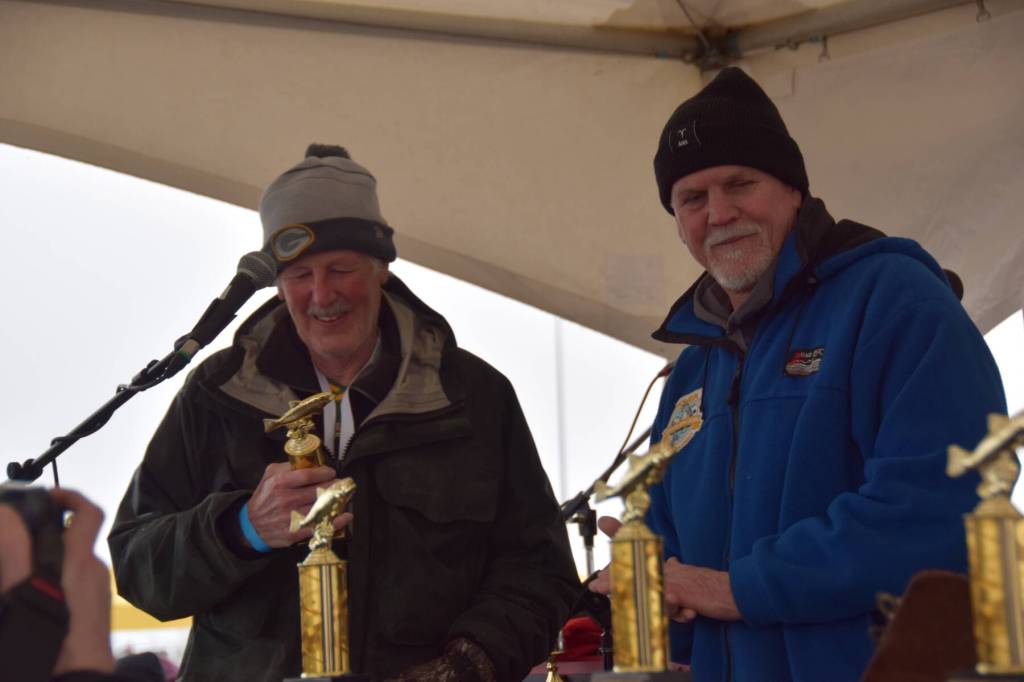 Arthur York, 84 (left), was the ninth-place winner at the 30th annual Homer Winter King Salmon Tournament on Saturday, March 23, 2024 at the Deep Water Dock on the Spit in Homer, Alaska. (Delcenia Cosman/Homer News)