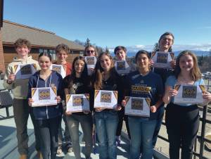 Photo provided by Paul Story
Homer High School Mariner Way Award winners for the 2023-2024 school year on the library balcony of the school during their award ceremony. The list of winners in the story are standing left to right in the image.