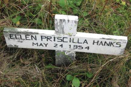 This cross in the Anchor Point Cemetery marks the grave of Rex and Irmgard Hankss daughter, who was stillborn in Seward on this date. (Photo courtesy of findagrave.com)
