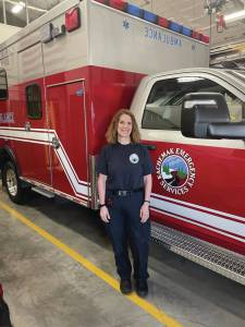 Wendy Bales stands in front of a service truck at the East End Road emergency services station last week. Photo by Emilie Springer