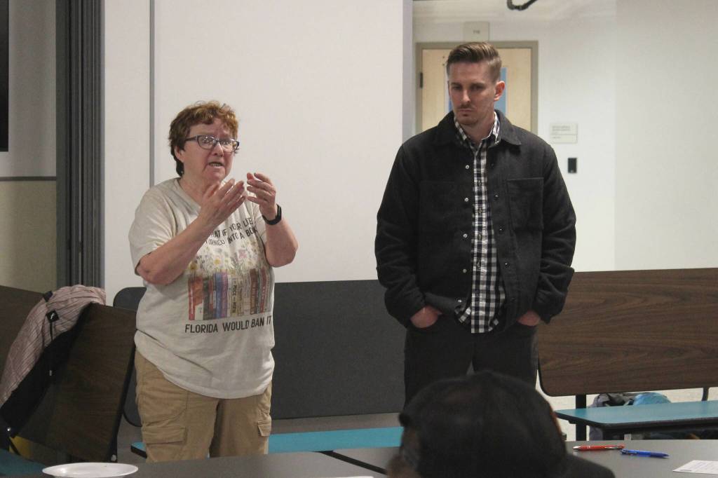 Kenai Peninsula Borough School District Board of Education member Patti Truesdell, left, and Kyle McFall, right, address attendees to gauge interest in a Denaina-focused charter school at a meeting hosted by the Kenaitze Indian Tribe on Thursday, March 28, 2024, in Kenai, Alaska. (Ashlyn OHara/Peninsula Clarion)