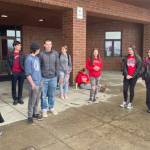 Homer High School students participate in a statewide school walkout organized to protest Gov. Mike Dunleavys veto of an education bill that would have increased school funding, Thursday, April 4, 2024, in Homer, Alaska. . (Photo by Emilie Springer/Homer News)