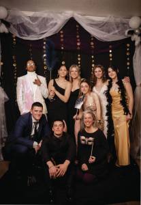Homer High School Yearbook students at the 2024 Great Gatsby prom. Left to right back: Ally High, Caitlyn Rogers, Minadora Reutov, Nathan Overson, William Bradshaw, Annabelle Franciscone, Sofia Loboy. Left to right front: Alaiyah Brost, Katelyn Marroquin, Suzanne Bishop, Julie Guess, Juliann Techie, Natalie Kientz, Amanda Toce