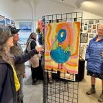 Homer community members browse art by local youth at Ptarmigan Arts Youth Arts Pop Up on Friday, April 5, 2024 in Homer, Alaska. Photo by Christina Whiting