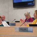 Jake Dye/Peninsula Clarion
Kelley Cizek, right, speaks as Jason Tauriainen, Patti Truesdell and Penny Vadla listen during a special meeting of the Kenai Peninsula Borough School Districts school board in Soldotna on Monday.