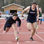 Soldotnas Wyatt Faircloth (left) edges out teammate Gabriel Almeida for the victory in the 300-meter hurdles Saturday, April 20, 2024, at the Soldotna Invitational at Soldotna High School in Soldotna, Alaska. (Photo by Jeff Helminiak/Peninsula Clarion)
