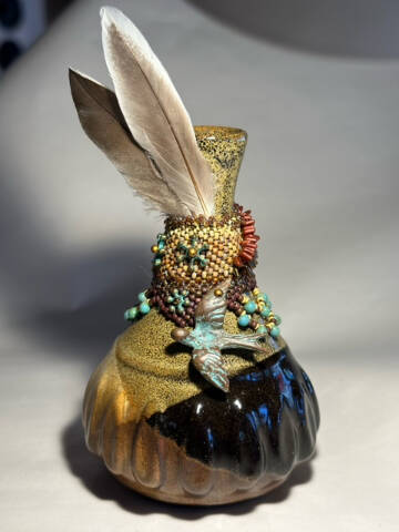 A beaded vase with feathers by Kathy Baldwin is on display at Ptarmigan Arts through May during their themed exhibit, Here a Bird, There a Bird, in Homer, Alaska. Photo provided by Ptarmigan Arts