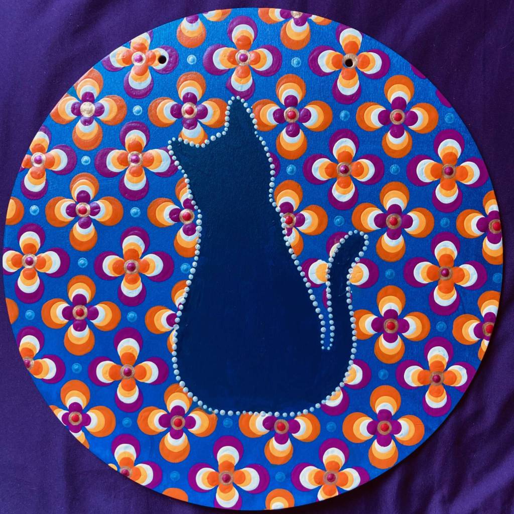 A cat-themed dot painting by Nancy Johnson is on display in her solo exhibit at Grace Ridge Brewing through May. Photo provided by Grace Ridge Brewing