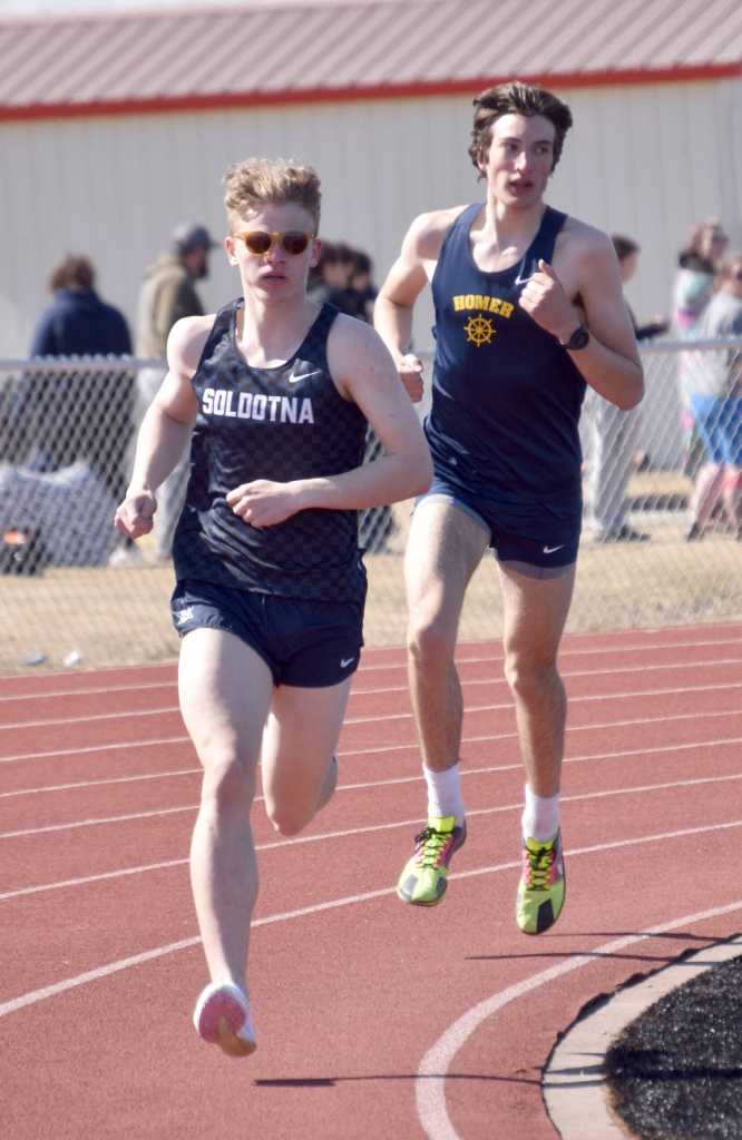 Soldotnas Elijah Jedlicki won the 1,600-meter run, with Homers Johannes Bynagle finishing second, Saturday, April 27, 2024, at the Kenai Invitational at Kenai Central High School in Kenai, Alaska. (Photo by Jeff Helminiak/Peninsula Clarion)