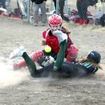 (Bruce Eggleston/matsusports.net) Colonys Kara Macy slides into home safely as the ball bounces in front of Kenai Central catcher Maggie Grenier at the Rally in the Valley tournament Thursday, April 25, 2024, at Colony Middle School in Palmer.
