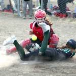Bruce Eggleston/matsusports.net
Colony's Kara Macy slides into home safely as the ball bounces in front of Kenai Central catcher Maggie Grenier at the Rally in the Valley tournament Thursday, April 25, 2024, at Colony Middle School in Palmer.