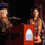 Faculty Chair Clair Kochis names Kaylee Gorrod a recipient of a Faculty Choice Award during the 54th Annual Kenai Peninsula College Commencement Ceremony at Kenai Central High School in Kenai, Alaska, on Thursday, May 9, 2024. (Jake Dye/Peninsula Clarion)
