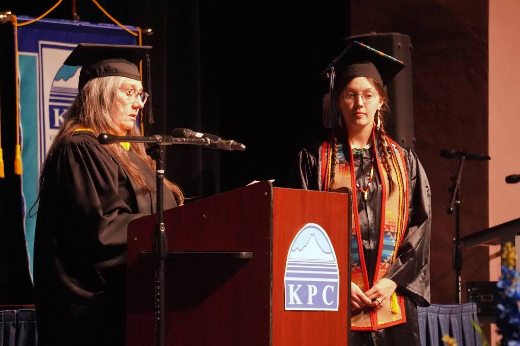 Faculty Chair Clair Kochis names Kaylee Gorrod a recipient of a Faculty Choice Award during the 54th Annual Kenai Peninsula College Commencement Ceremony at Kenai Central High School in Kenai, Alaska, on Thursday, May 9, 2024. (Jake Dye/Peninsula Clarion)