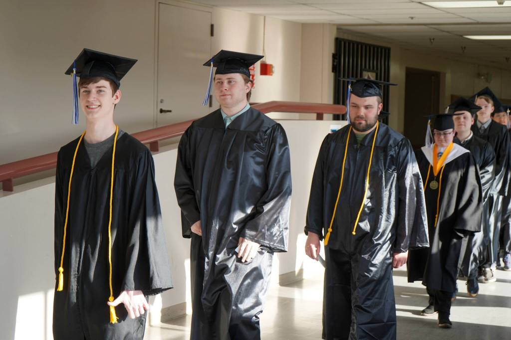 Graduates of Kenai Peninsula College proceed into the 54th Annual Kenai Peninsula College Commencement Ceremony at Kenai Central High School in Kenai, Alaska, on Thursday, May 9, 2024. (Jake Dye/Peninsula Clarion)