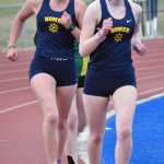Homers Claira Booz and Jaela Marchbanks lead Sewards Selah Brueckner in the 3,200 meters Saturday, May 11, 2024, at the Kenai Peninsula Borough meet at Soldotna High School in Soldotna, Alaska. Booz won the race. (Photo by Jeff Helminiak/Peninsula Clarion)