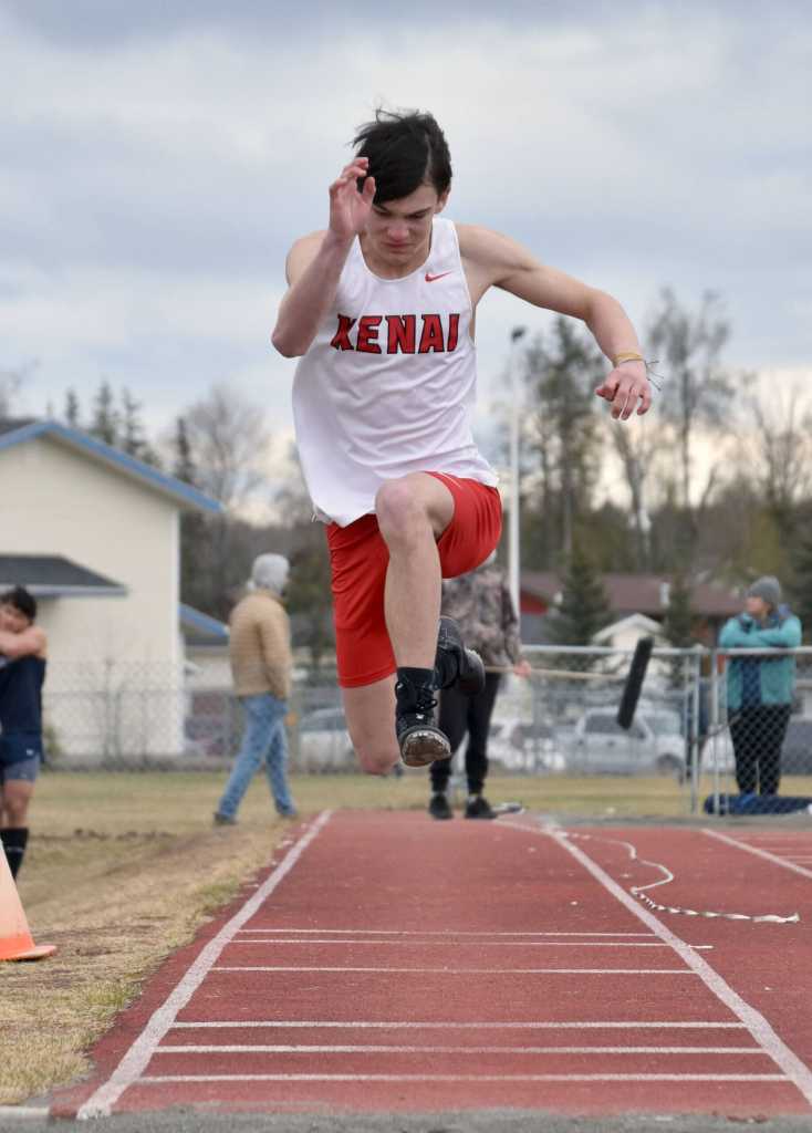 Kenai Centrals Gage Ivy competes in the triple jump Saturday, May 11, 2024, at the Kenai Peninsula Borough meet at Soldotna High School in Soldotna, Alaska. (Photo by Jeff Helminiak/Peninsula Clarion)