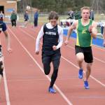 Soldotnas Leigh Tacey II beats Soldotnas Tyce Escott, Sewards Ronan Bickling and Soldotnas Lokeni Wong to the line in the 100 meters Saturday, May 11, 2024, at the Kenai Peninsula Borough meet at Soldotna High School in Soldotna, Alaska. (Photo by Jeff Helminiak/Peninsula Clarion)