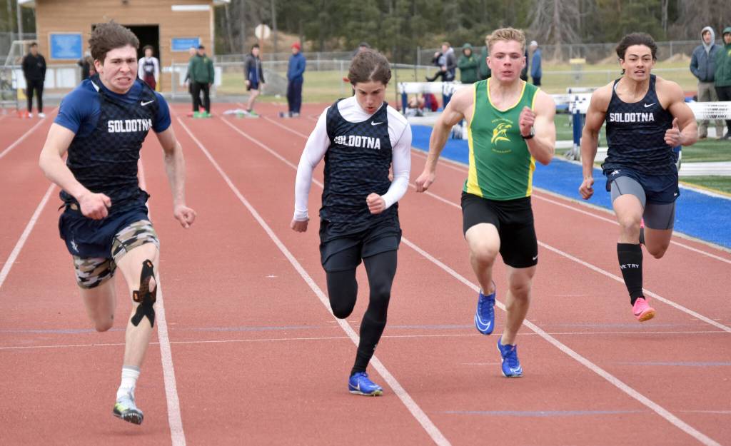 Soldotnas Leigh Tacey II beats Soldotnas Tyce Escott, Sewards Ronan Bickling and Soldotnas Lokeni Wong to the line in the 100 meters Saturday, May 11, 2024, at the Kenai Peninsula Borough meet at Soldotna High School in Soldotna, Alaska. (Photo by Jeff Helminiak/Peninsula Clarion)