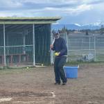 Coach Bill Bell pitching for Mariner softball at practice on Monday at Jack Gist Park in Homer. Emilie Springer/ Homer News.