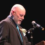 Connections Homeschool Principal Doug Hayman welcomes attendees to the schools commencement ceremony on Thursday, May 16, 2024 in Soldotna, Alaska. (Ashlyn OHara/Peninsula Clarion)