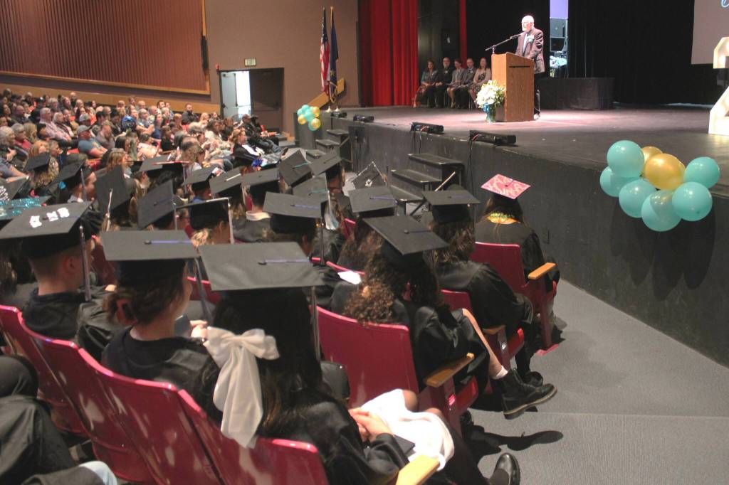 Graduates listen to Connections Homeschool Principal Doug Hayman speak during the schools commencement ceremony on Thursday, May 16, 2024 in Soldotna, Alaska. (Ashlyn OHara/Peninsula Clarion)