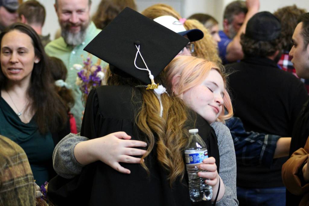 Graduates celebrate with their friends and loved ones after Connections Homeschools commencement ceremony on Thursday, May 16, 2024 in Soldotna, Alaska. (Ashlyn OHara/Peninsula Clarion)