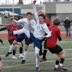 Soldotnas Zac Buckbee and Daniel Heath battle for the ball Saturday, May 18, 2024, at the Peninsula Conference tournament at Kenai Central High School in Kenai, Alaska. (Photo by Jeff Helminiak/Peninsula Clarion)