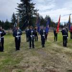 The Memorial Day service held at Hickerson Memorial Cemetery on Monday, May 27, 2024 in Homer, Alaska, includes an honor guard (front) and color guard (rear) comprised of members of the American Legion Posts 16 and 18 and the VFW Post 10221. (Delcenia Cosman/Homer News)