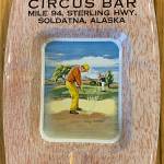 This circa-1950s souvenir ashtray from the Circus Bar was donated to the Soldotna Historical Society by Virgil Dahler. The irony of the illustration in the bottom of the ashtray is that a golf course opened across from the bar in the early 1970s.
