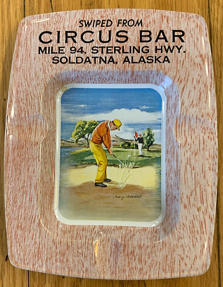 This circa-1950s souvenir ashtray from the Circus Bar was donated to the Soldotna Historical Society by Virgil Dahler. The irony of the illustration in the bottom of the ashtray is that a golf course opened across from the bar in the early 1970s.